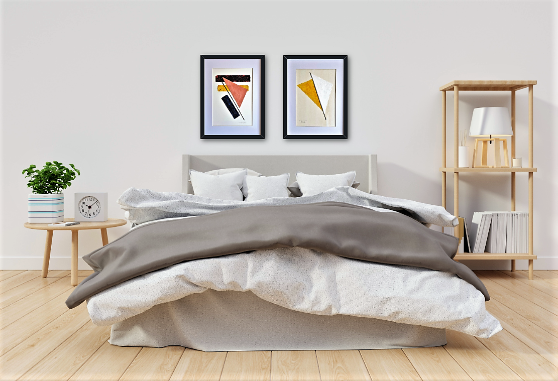 Dormitorio nórdico con cuadros modernos